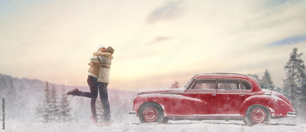 loving couple and vintage car