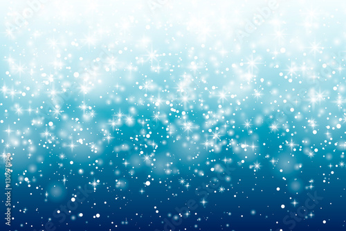 Falling snow on a blue background. Vector illustration 10 EPS. Abstract white glitter snowflake background. Vector magic Christmas eve snowfall.