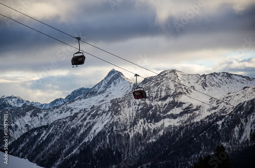 Ski lift with dramatic landscape