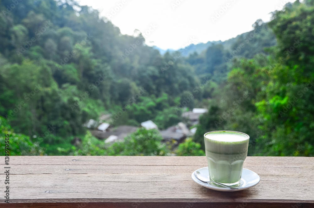 Milk green tea with natural background