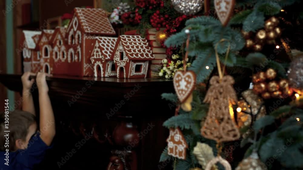 Small children enjoy gifts in the Christmas tree Small children enjoy gifts in the Christmas tree