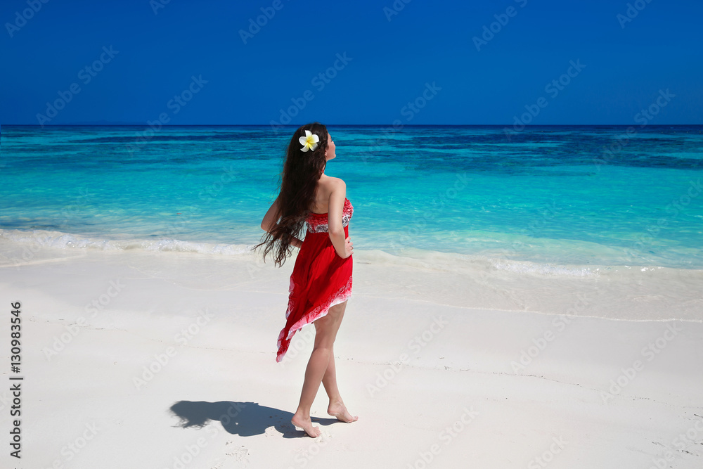 Beautiful free young woman relax on the exotic sea, brunette smi Beautiful free young woman relax on the exotic sea, brunette smi