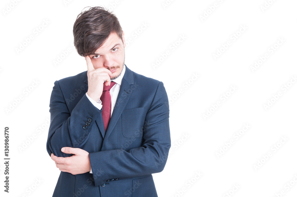 Man wearing suit being pensive or thinking Man wearing suit being pensive or thinking