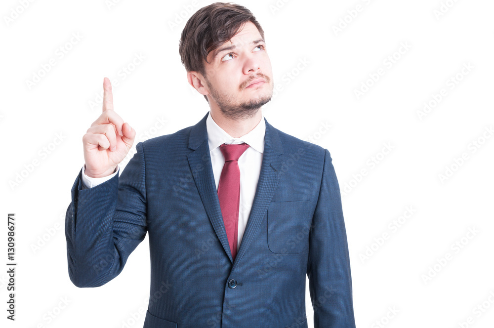 Marketing man showing idea gesture or looking up Marketing man showing idea gesture or looking up