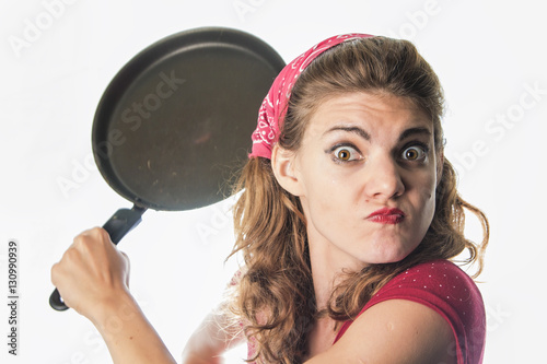 Red retro woman threatening with a frying pan, white background photo