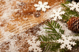 Christmas decorations on a rustic wood background.