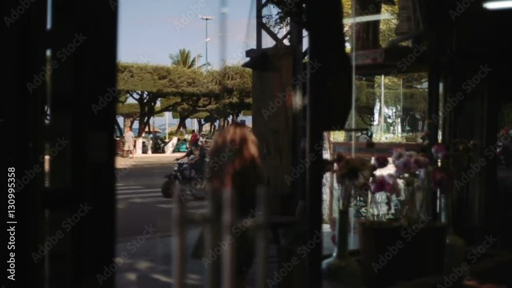View on road with palms and embankment in resort city, vacation, journey View on road with palms and embankment in resort city, vacation, journey