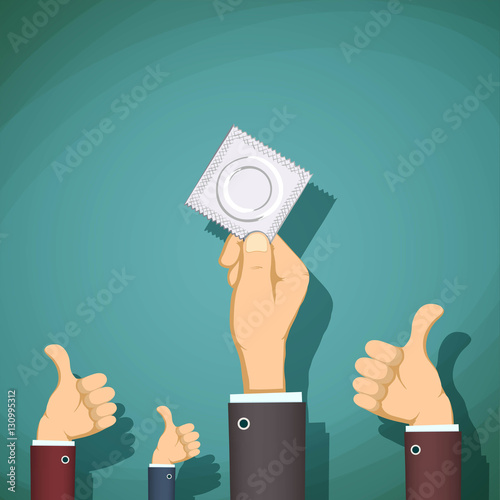 Man holding a condom in her hand. Prevention of sexually transmi