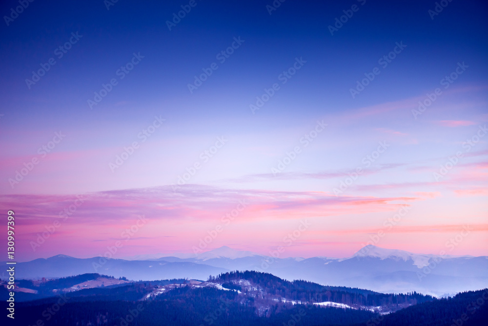 Amazing evening winter landscape. Carpathian mountains, Ukraine, Europe. Beautiful nature background