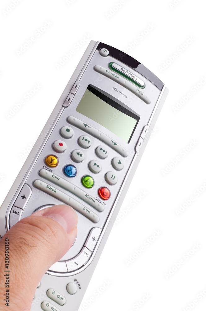 A hand holding a remote control isolated over a white background A hand holding a remote control isolated over a white background
