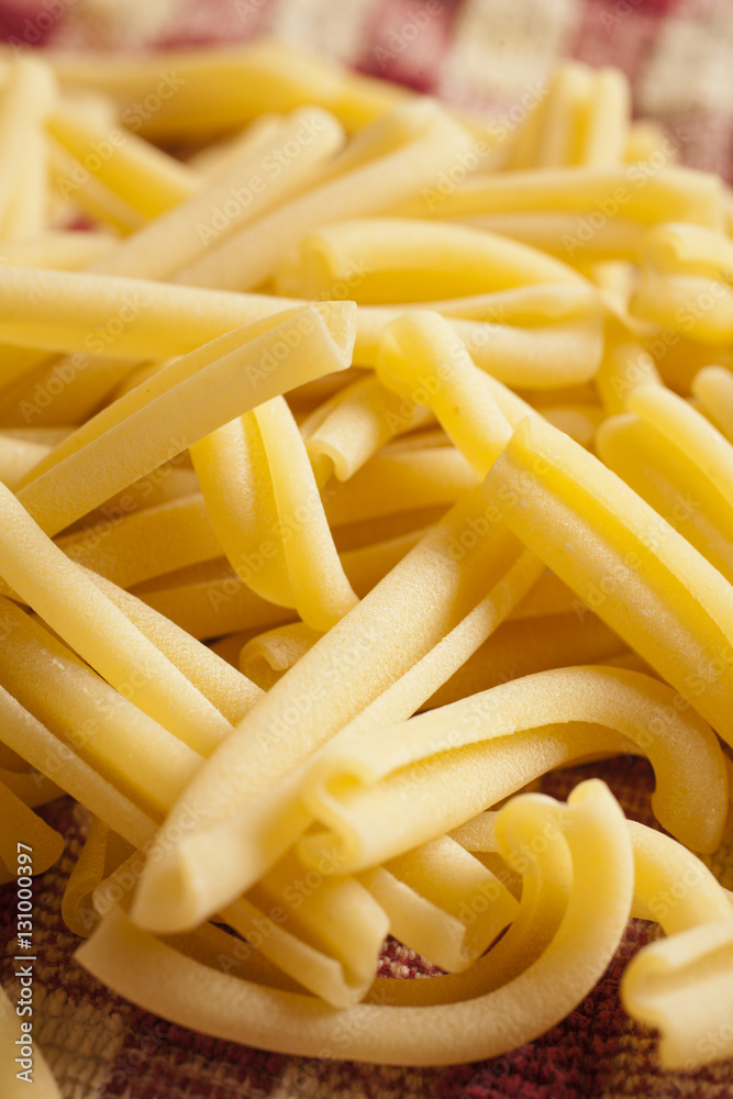 dry uncooked strozzapreti pasta dry uncooked strozzapreti pasta