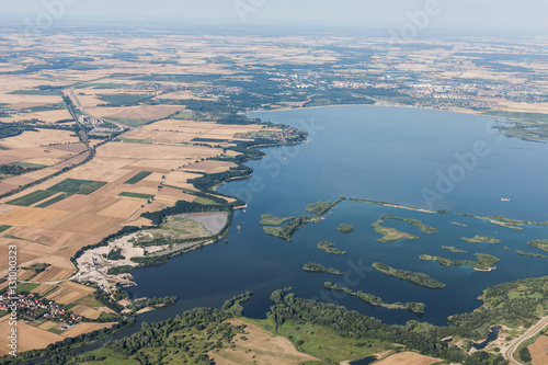 aerial view of Nysa lake and green harvest fields