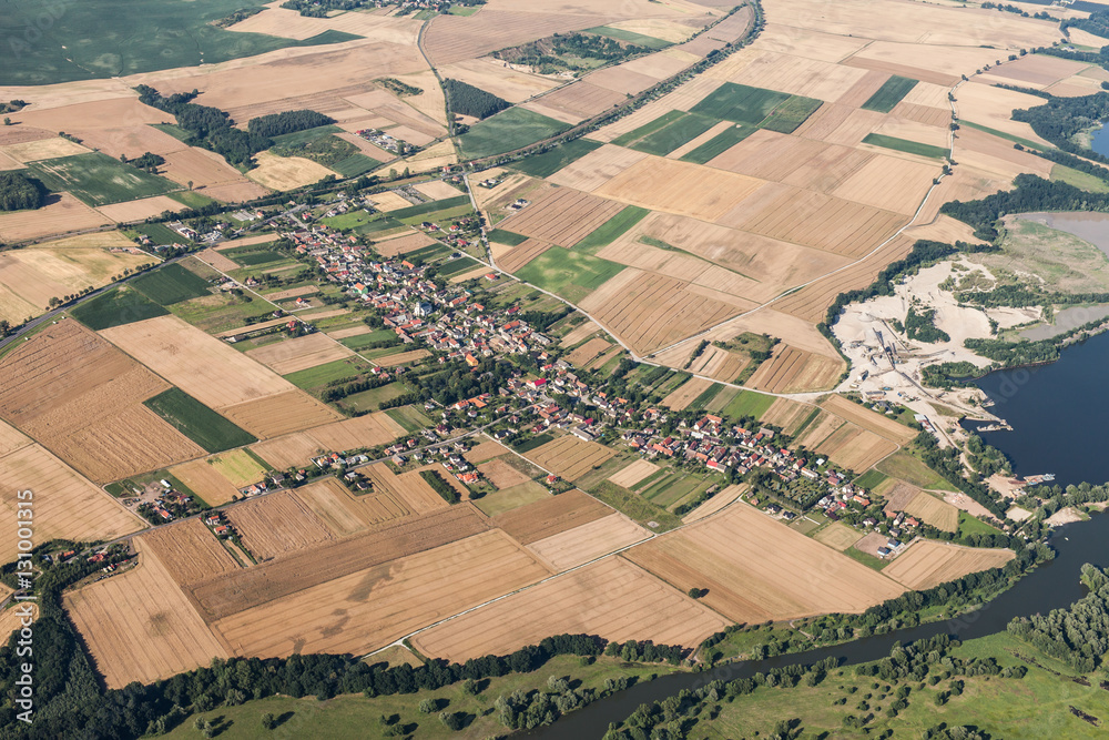 aerial view of Nysa lake and green harvest fields