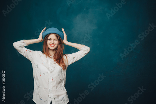 Woman with blue hat