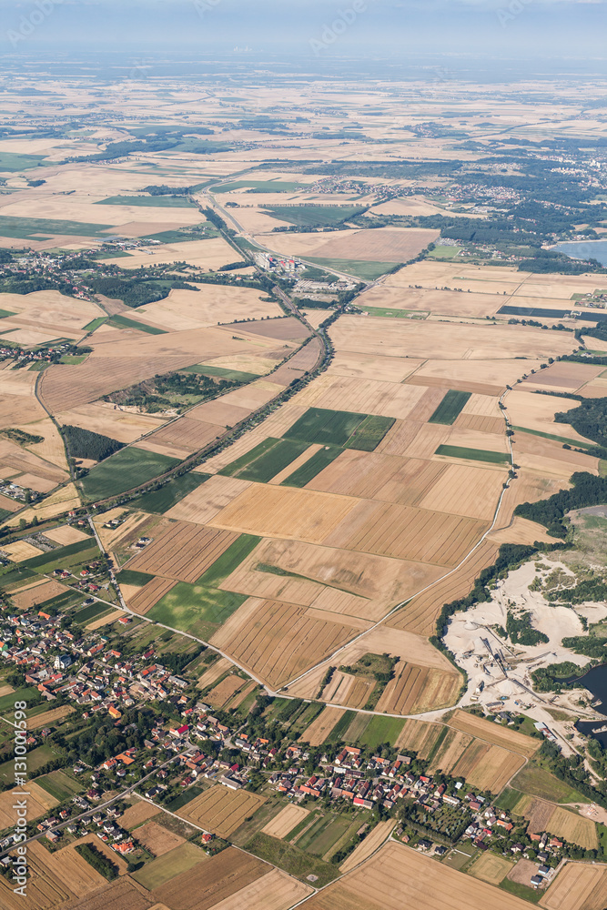 aerial view of Nysa lake and green harvest fields