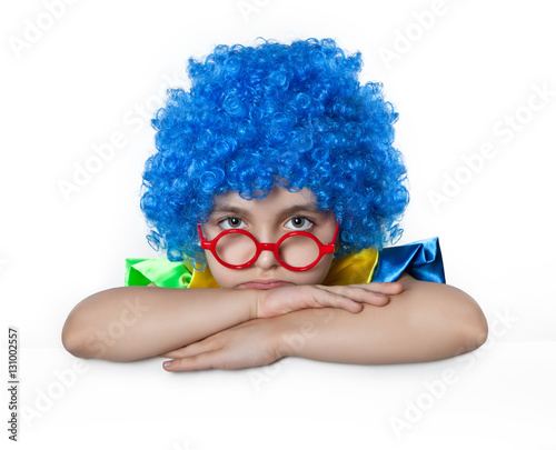 Sad girl in the blue wig with glasses on his nose