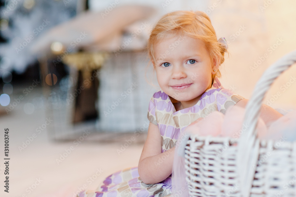 Fototapeta premium Portrait of a little girl in her room