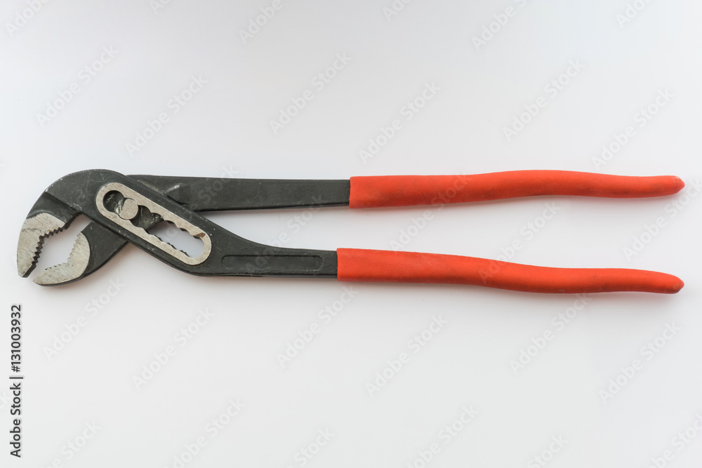 Locking pliers, close up / Red pliers on white background
Locking pliers, close up / Red pliers on white background