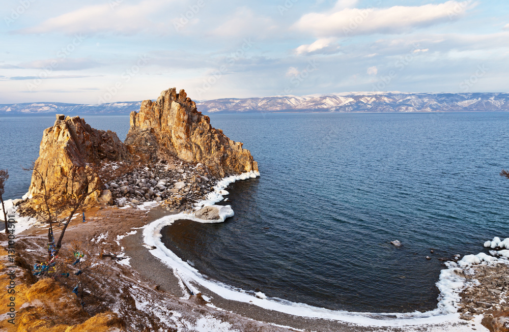 Baikal Lake in December. Shamanka Rock and the bay on a cold morning