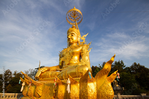 Golden Buddha Image with blue sky