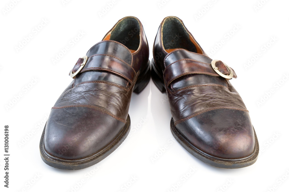 Leather shoes / View of old leather shoes on white background. Leather shoes / View of old leather shoes on white background.