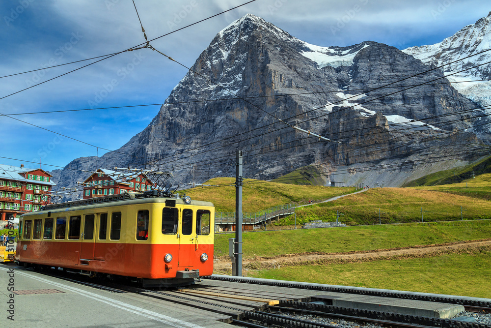 Retro tourist train and Eiger North face, Bernese Oberland, Switzerland