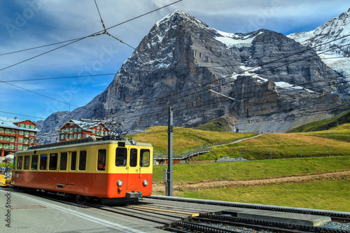 Retro tourist train and Eiger North face, Bernese Oberland, Switzerland