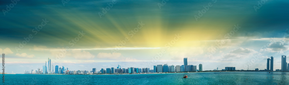 Abu Dhabi, UAE. Panoramic cityscape view at sunset from Marina v