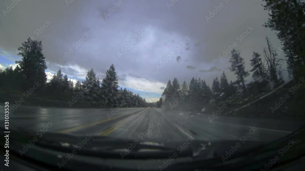 Rainy Dashcam Time-lapse. Rain pours heavily creating dangerous driving conditions during a long roadtrip in rural Nevada. Rainy Dashcam Time-lapse. Rain pours heavily creating dangerous driving conditions during a long roadtrip in rural Nevada.