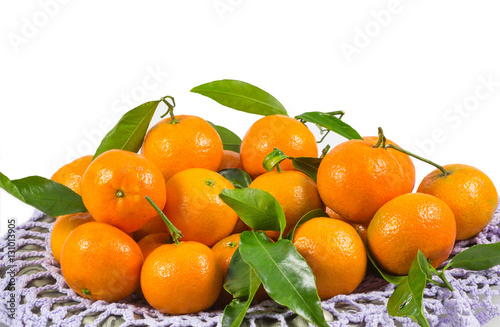 Bunch of fresh tangerines oranges in white background.
