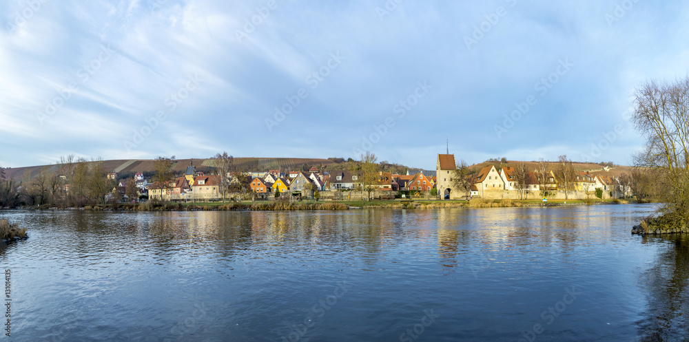 Segnitz with reflection in river Main