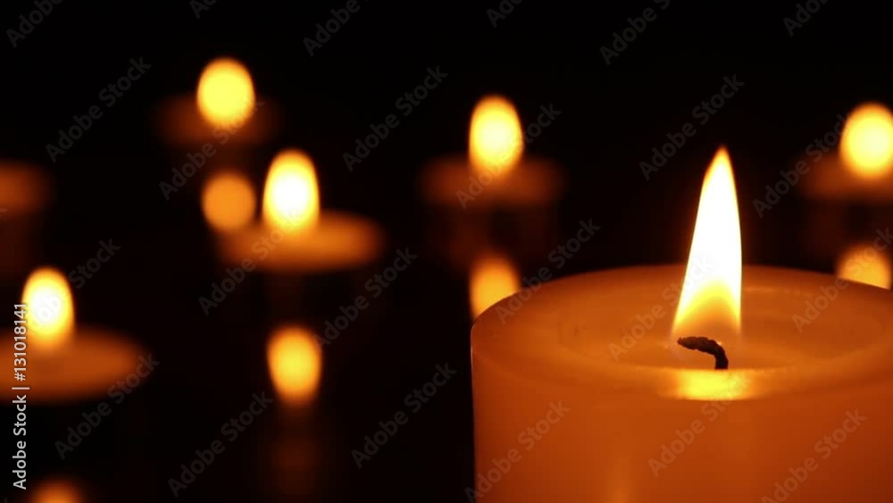 Candle light close up. Candle burnning with bokeh lights on the background. Romantic candles Candle light close up. Candle burnning with bokeh lights on the background. Romantic candles