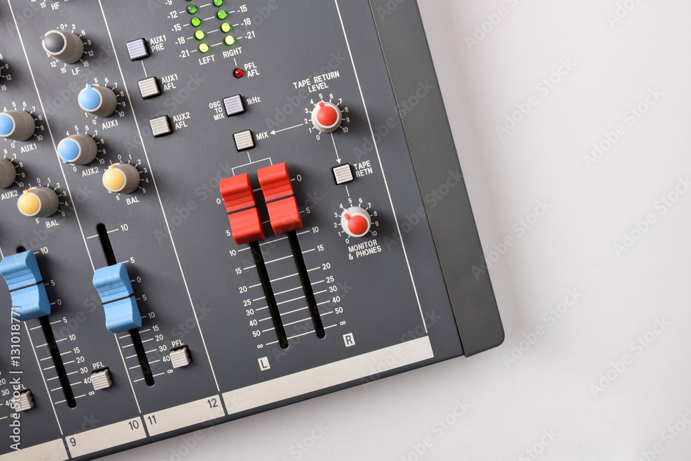 Close up sound mixer top view on white table Close up sound mixer top view on white table