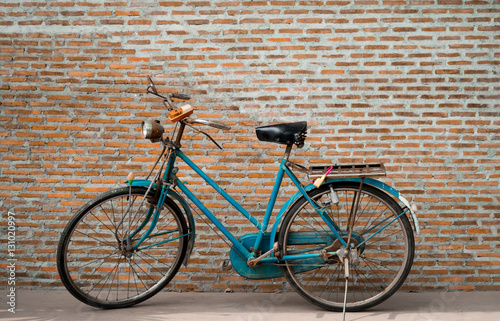 Classic Retro Bicycle Parked brick wall © Nuthasak