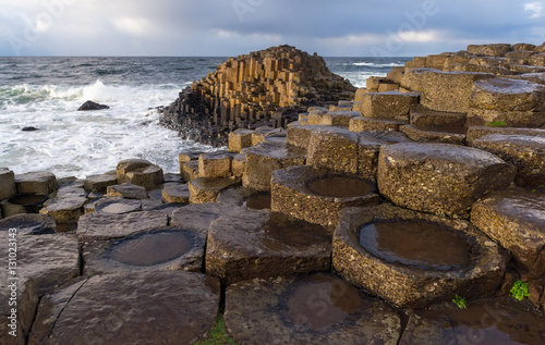 Tidal waves crash against the basalt rocks of the Giant's Causeway, Northern Ireland