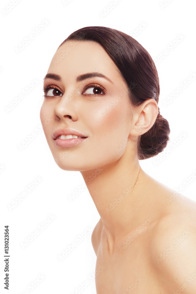 Portrait of young beautiful healthy happy woman looking upwards, over white background Portrait of young beautiful healthy happy woman looking upwards, over white background