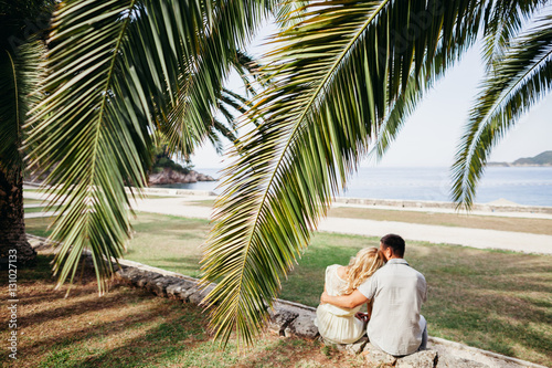 Wallpaper Mural lovely couple relax on beach together Torontodigital.ca
