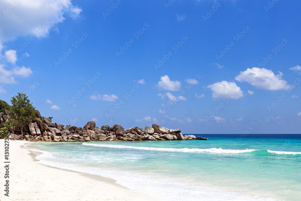 Waves on beautiful tropical beach Seychelles islands