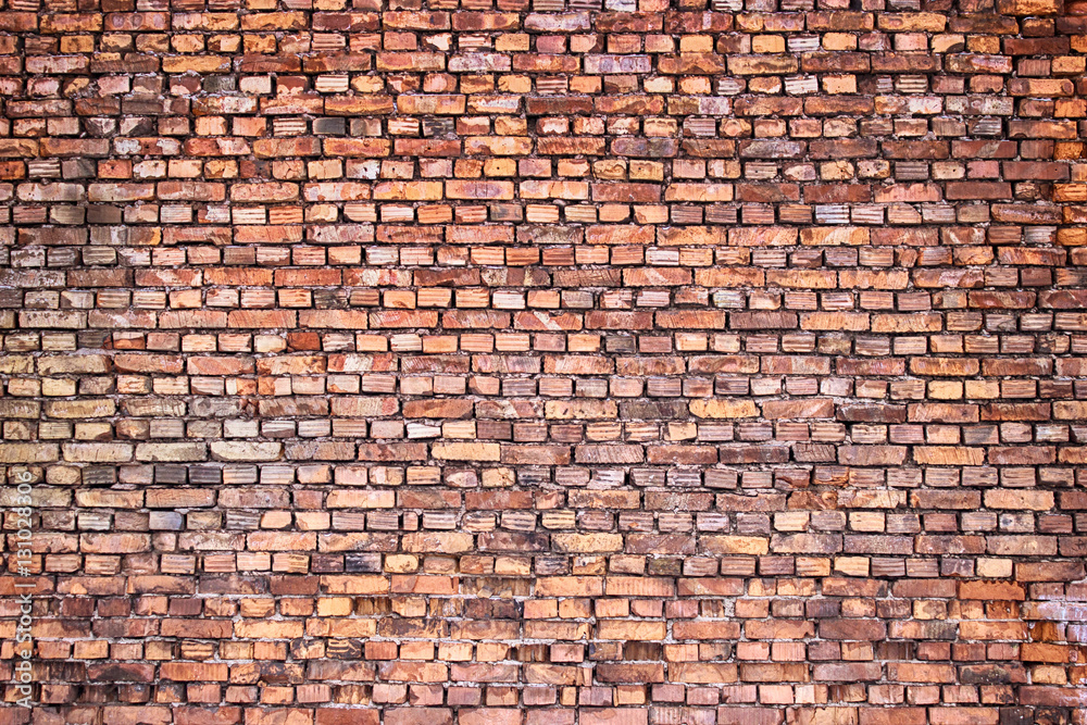 Fototapeta premium vintage brick wall, urban background, red stone texture