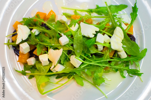 Fresh diet salad with arugula; pumpkin and beets. Delicious and