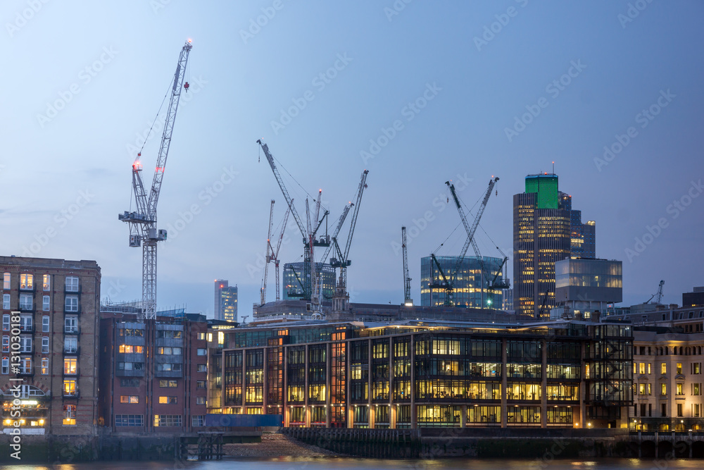 LONDON, ENGLAND - JUNE 17 2016: Night Photo of Thames River and skyscrapers, London, Great Britain