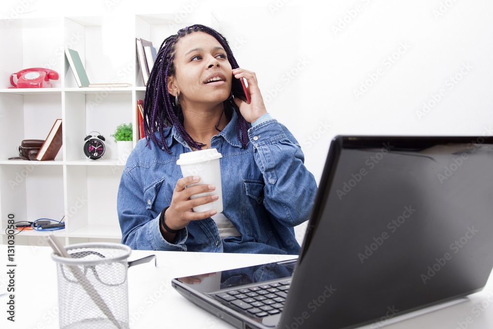 young woman with mobile phone and laptop computer young woman with mobile phone and laptop computer