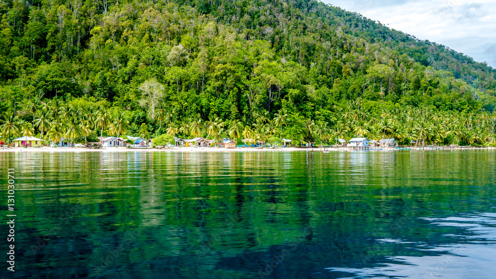 Fototapeta premium Village on Monsuar Island. Raja Ampat, Indonesia, West Papua