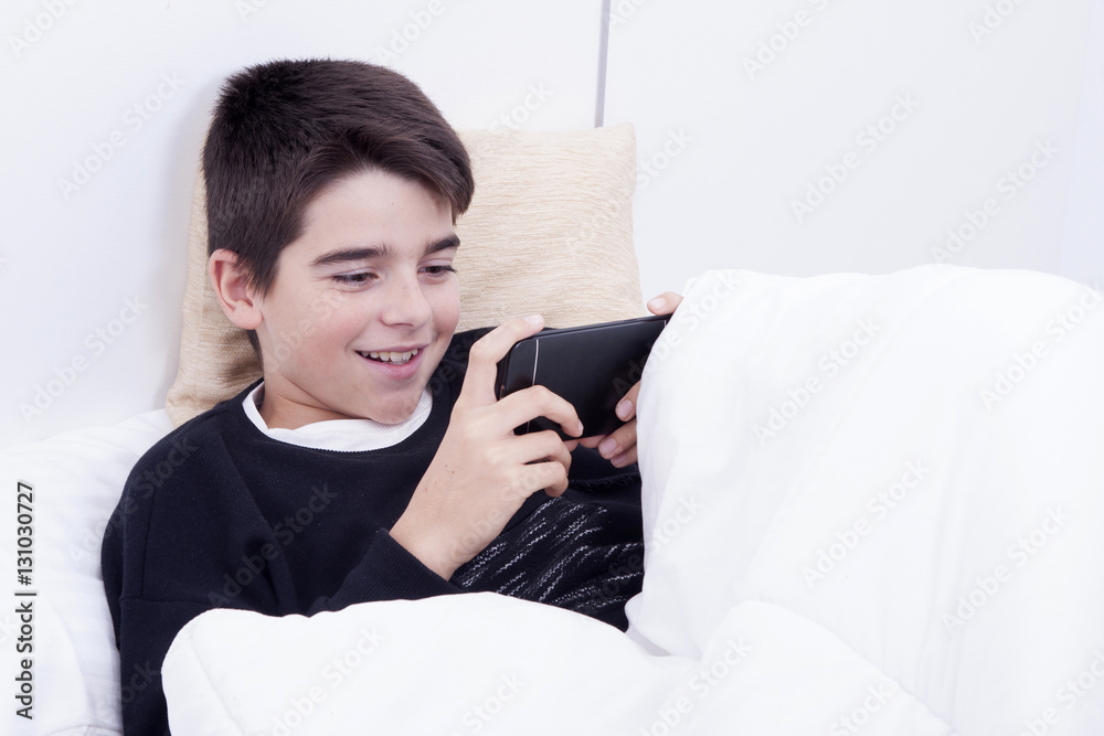 child playing with the phone at home