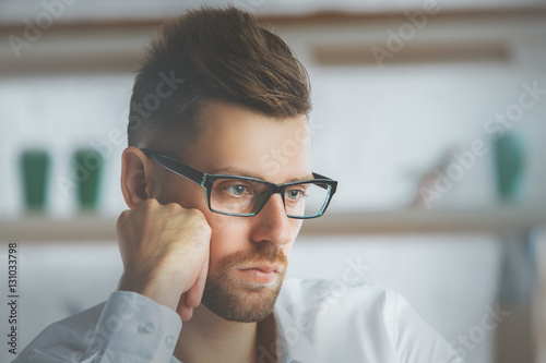 Thoughtful businessman portrait