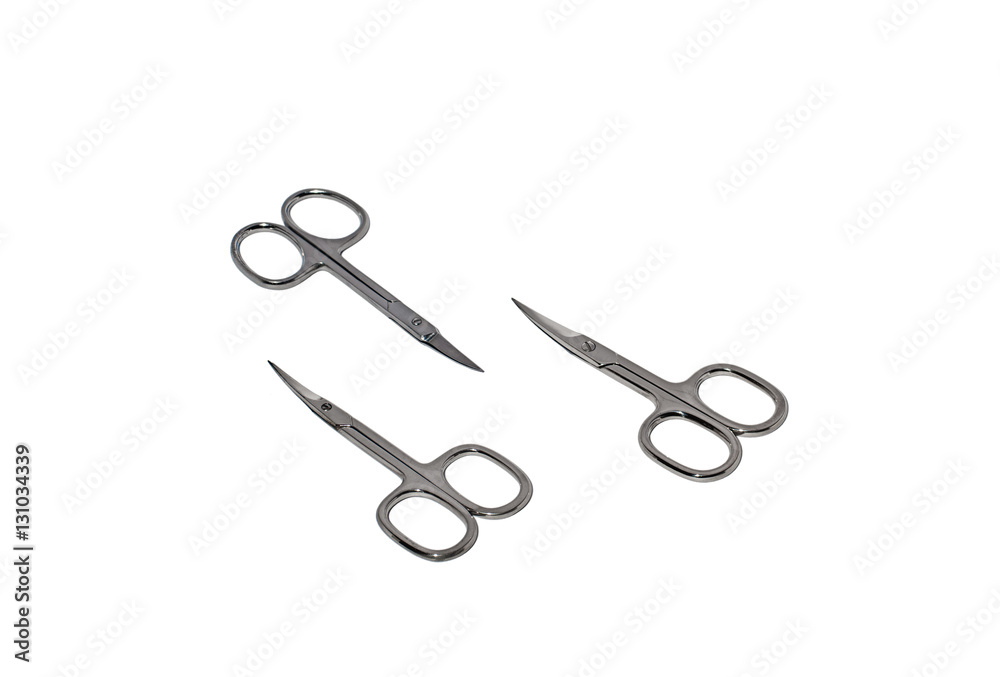 Three different nail scissors isolated on a white background Three different nail scissors isolated on a white background