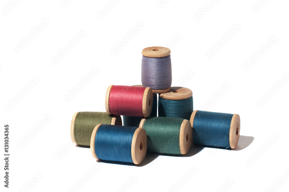 Spool of thread isolated on white background