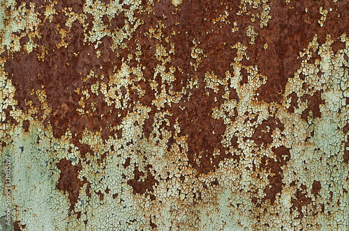 Rusty metal with the paint peeled, old metal corroded surface. Old texture for backgrounds.