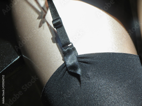 Konstfotografi black satin suspender belt and stockings