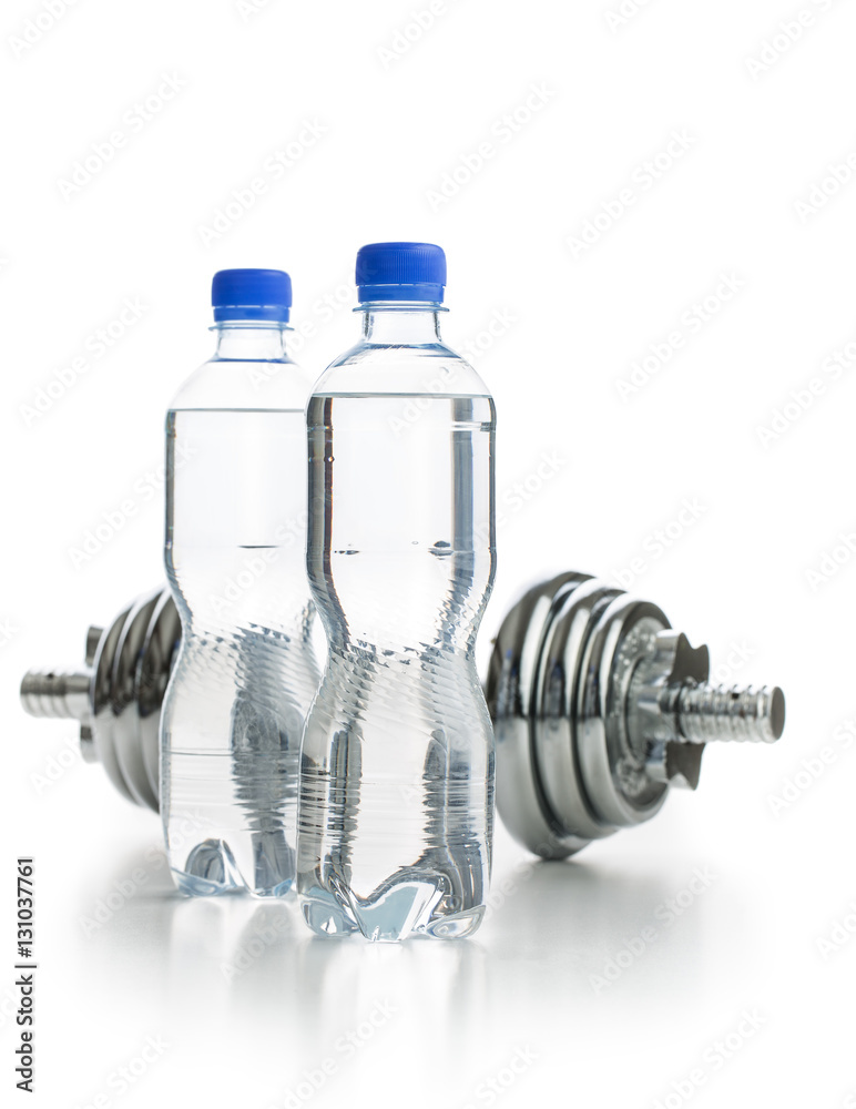 Bottle water and dumbbell. Bottle water and dumbbell.